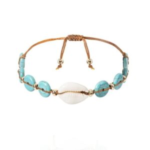 Bracelet Cauri Bleu Clair. Acheter vos vêtements africains en ligne sur Monde Africain.com .