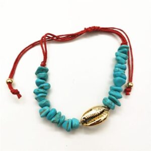 Bracelet Cauri Bleu Rouge. Acheter vos vêtements africains en ligne sur Monde Africain.com .